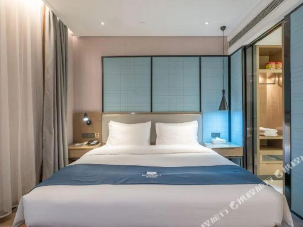 Bed in Echarm Hotel Jinan Railway Station Daming Lake