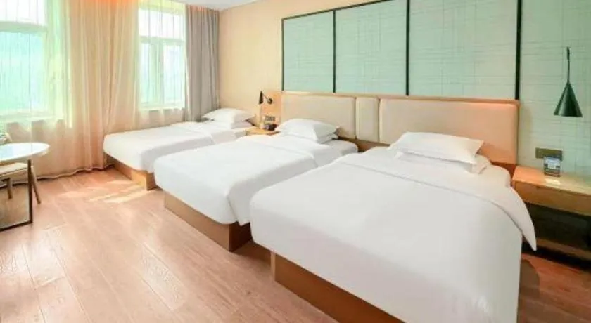 Bed in Echarm Hotel Jinan Railway Station Daming Lake