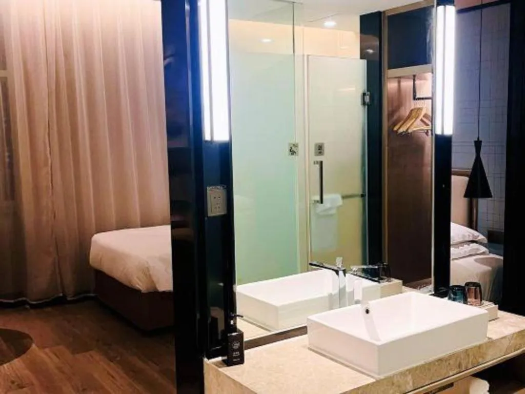 Bed in Echarm Hotel Jinan Railway Station Daming Lake