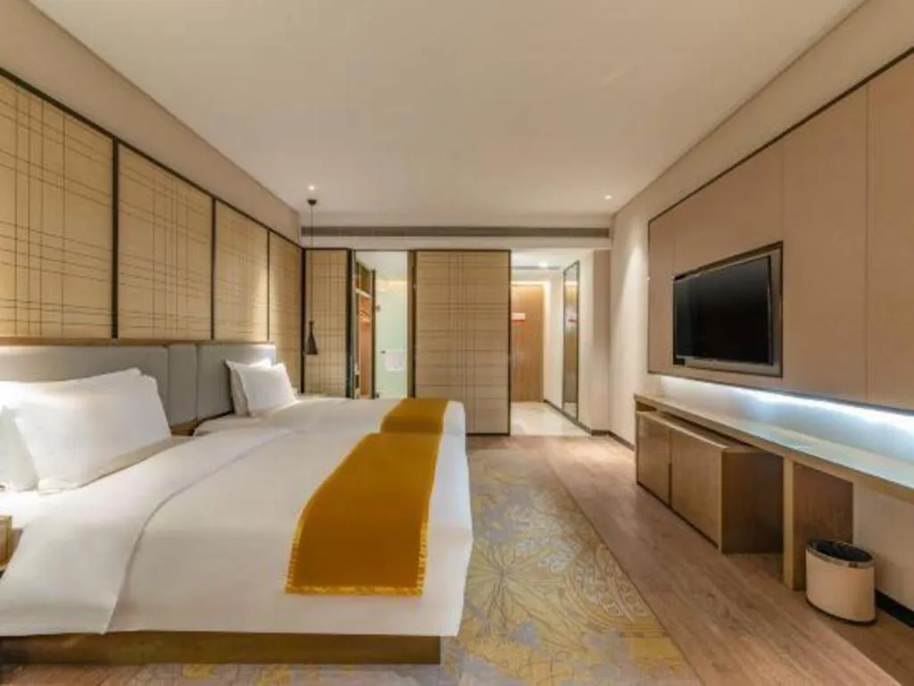 Bed in Echarm Hotel Jinan Railway Station Daming Lake