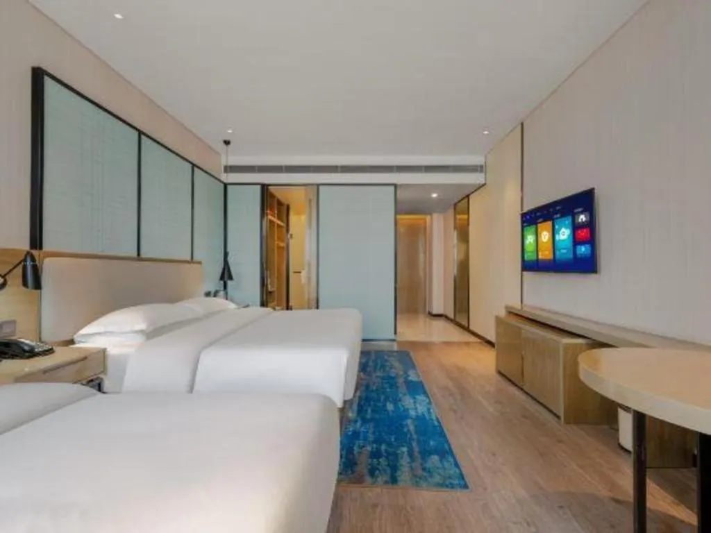 Bed in Echarm Hotel Jinan Railway Station Daming Lake