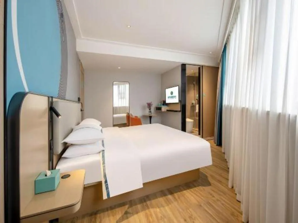 Bed in City Comfort Inn Wuzhou Municipal Square