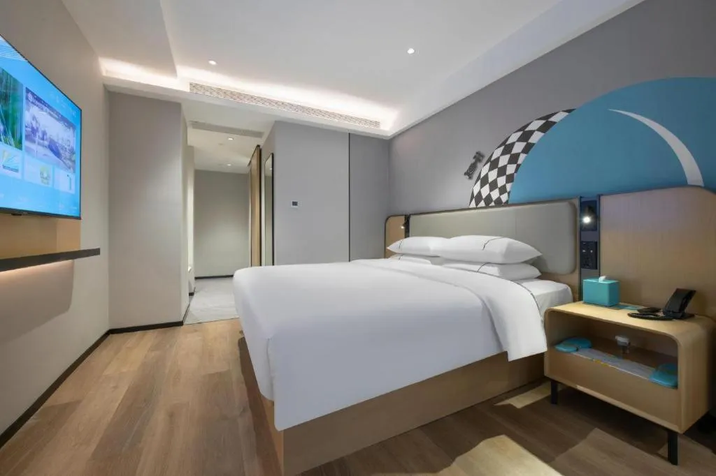 Bed in City Comfort Inn Wuzhou Municipal Square