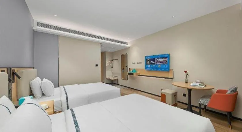 Bed in City Comfort Inn Wuzhou Municipal Square