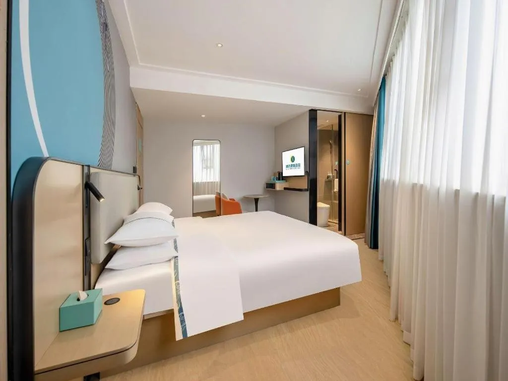 Bed in City Comfort Inn Wuzhou Municipal Square