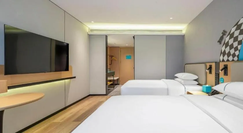 Bed in City Comfort Inn Wuzhou Municipal Square