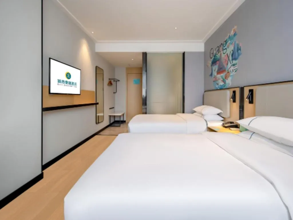 Bed in City Comfort Inn Wuzhou Municipal Square