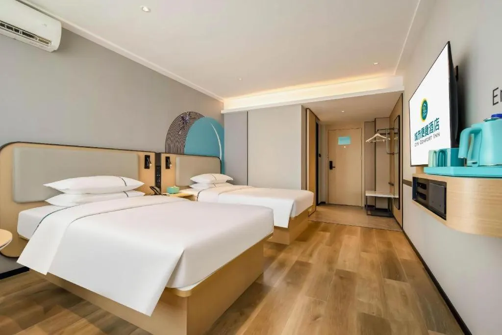 Bed in City Comfort Inn Wuzhou Municipal Square