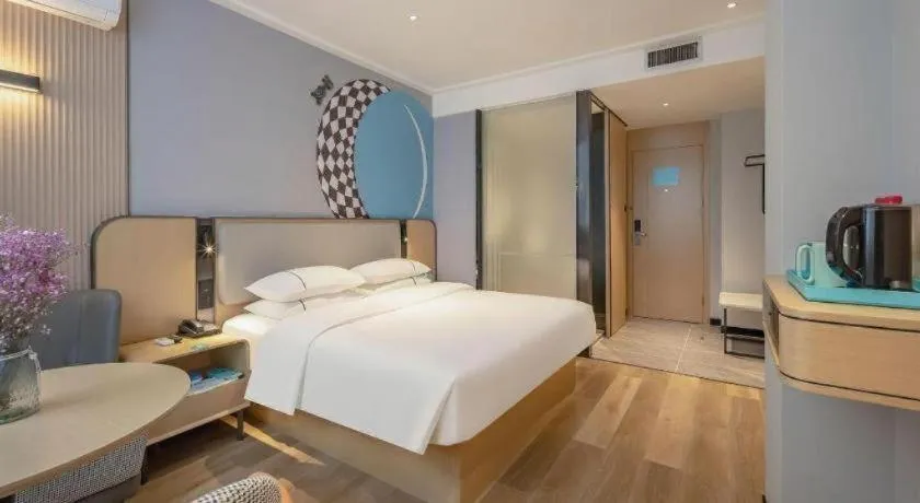 Bed in City Comfort Inn Wuzhou Municipal Square