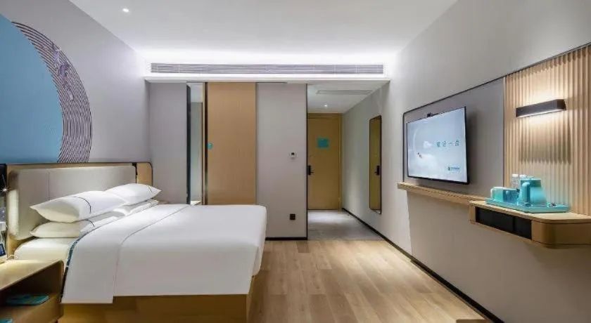 Bed in City Comfort Inn Wuzhou Municipal Square