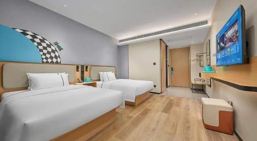 Bed in City Comfort Inn Wuzhou Municipal Square