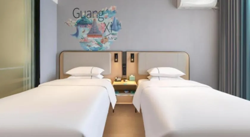 Bed in City Comfort Inn Wuzhou Municipal Square