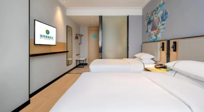 Bed in City Comfort Inn Wuzhou Municipal Square
