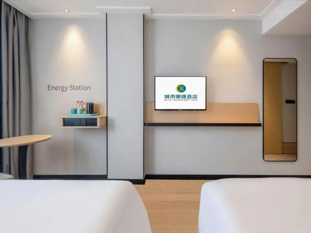 Bed in City Comfort Inn Wuzhou Municipal Square