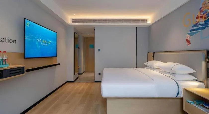 Bed in City Comfort Inn Wuzhou Municipal Square