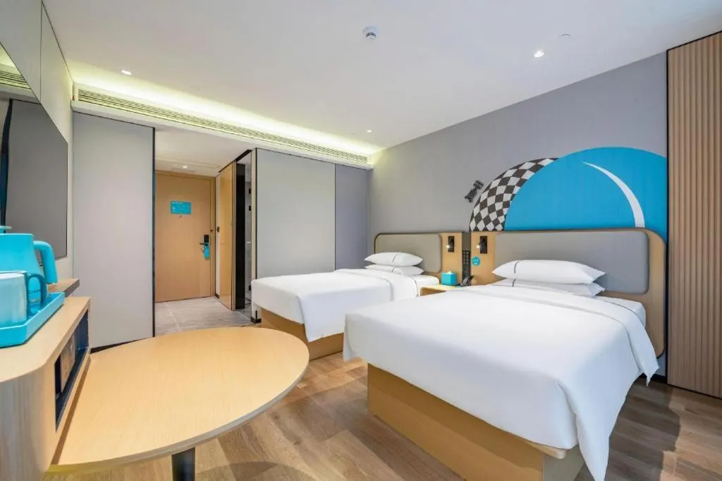 Bed in City Comfort Inn Wuzhou Municipal Square