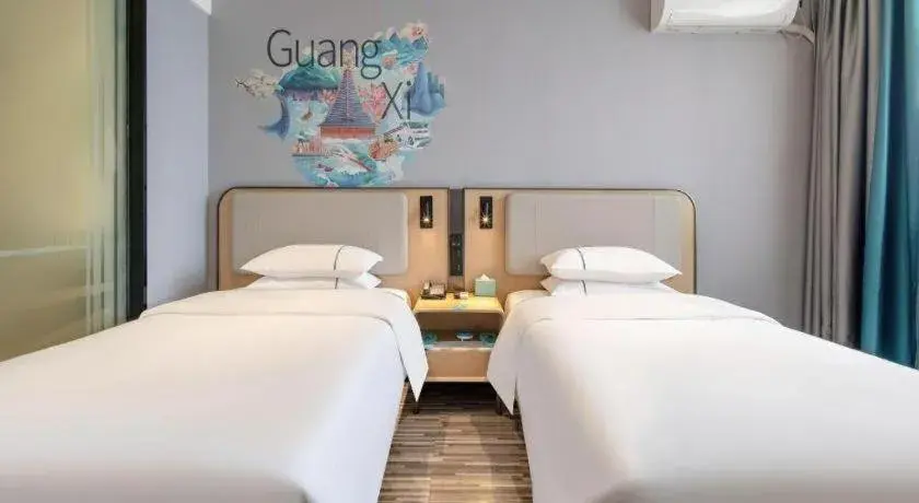 Bed in City Comfort Inn Wuzhou Municipal Square Bed in City Comfort Inn Wuzhou Municipal Square