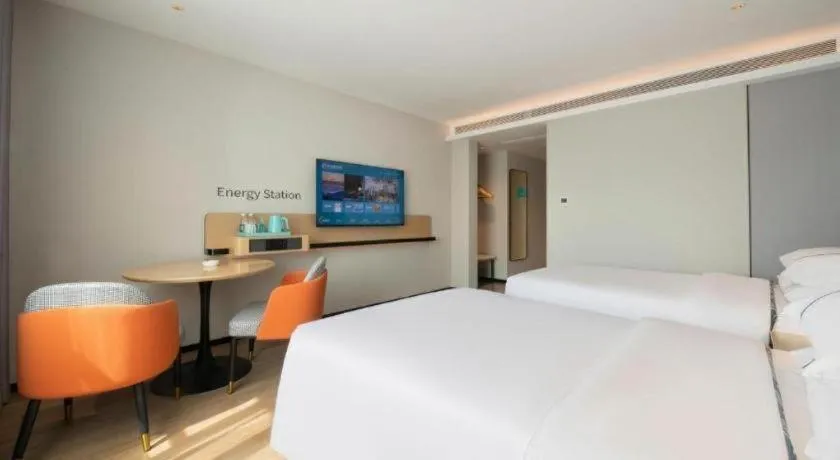 Bed in City Comfort Inn Wuzhou Municipal Square