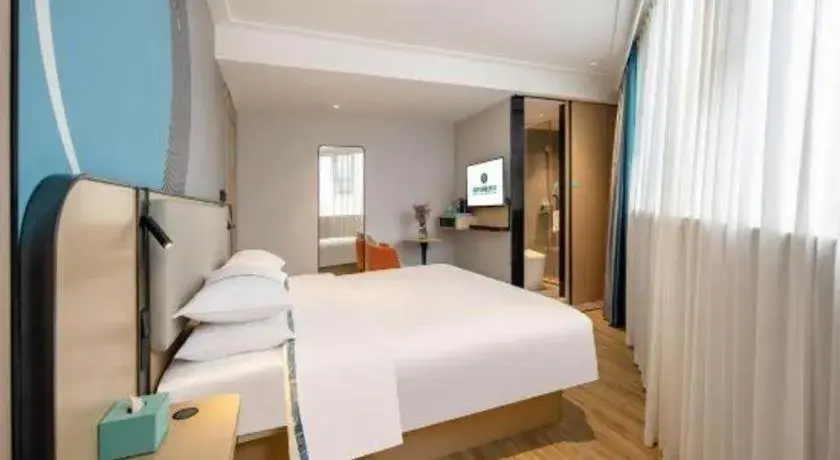 Bed in City Comfort Inn Wuzhou Municipal Square Bed in City Comfort Inn Wuzhou Municipal Square