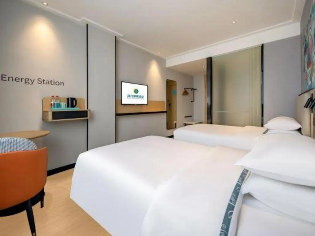 Bed in City Comfort Inn Wuzhou Municipal Square