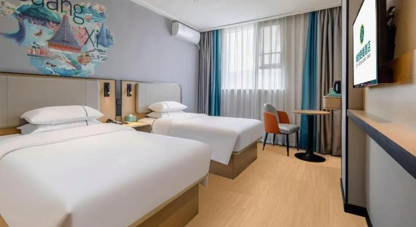 Bed in City Comfort Inn Wuzhou Municipal Square
