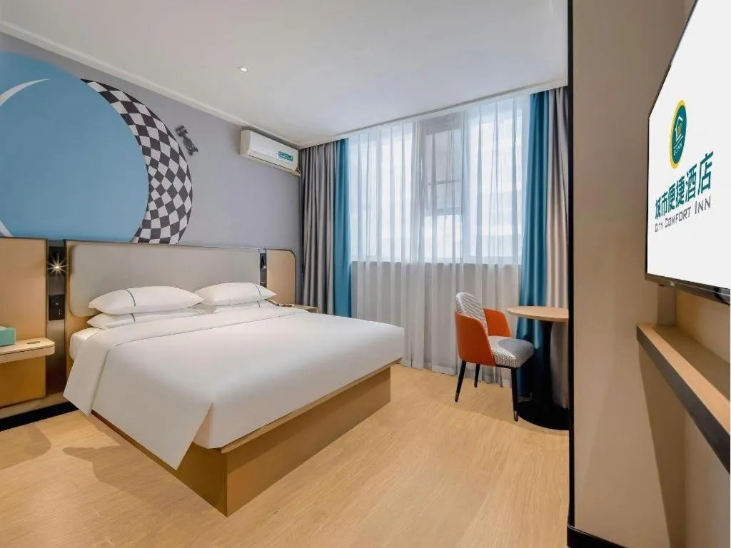 Bed in City Comfort Inn Wuzhou Municipal Square