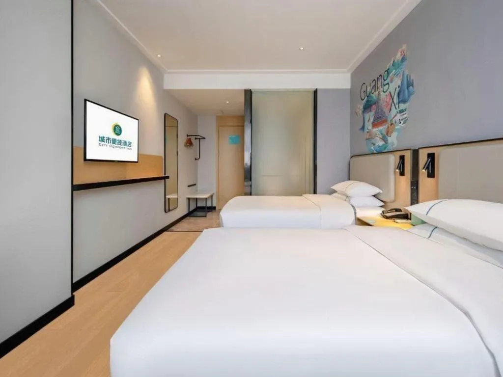 Bed in City Comfort Inn Wuzhou Municipal Square