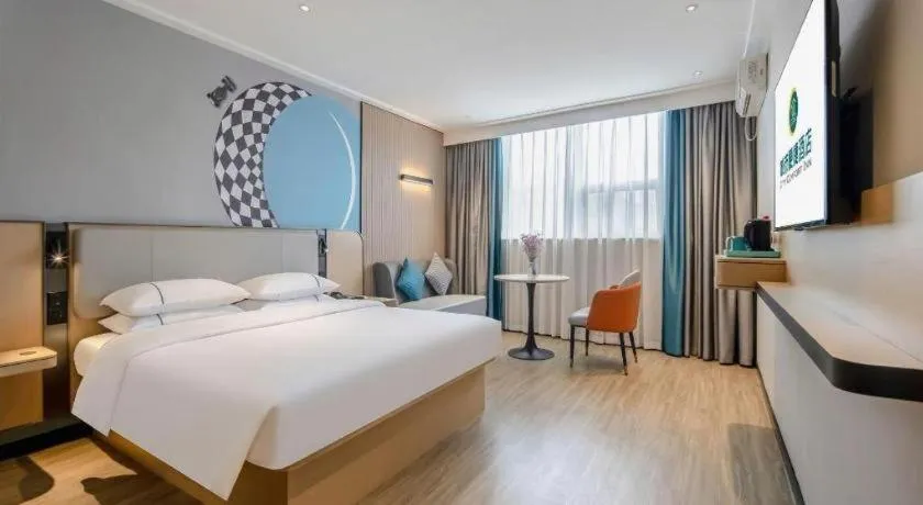 Bed in City Comfort Inn Wuzhou Municipal Square