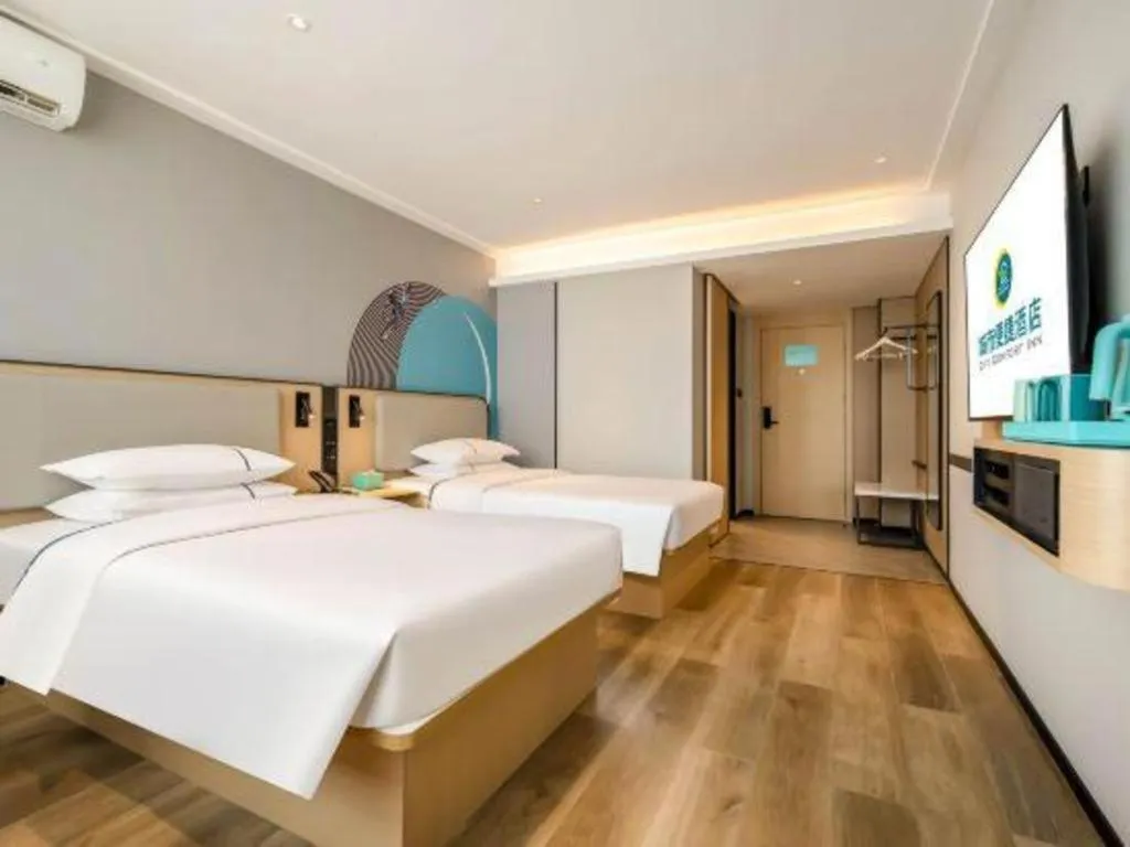 Bed in City Comfort Inn Wuzhou Municipal Square