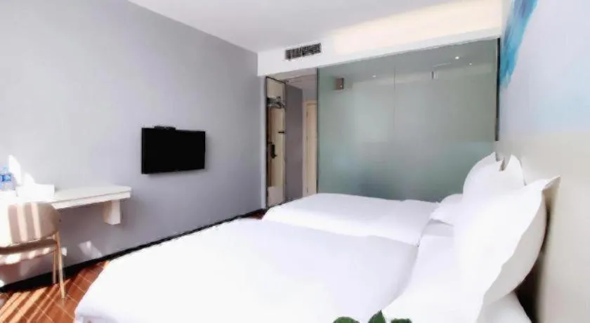 Bed in Wenxing Hotel Guangzhou Nanfang Hospital Branch
