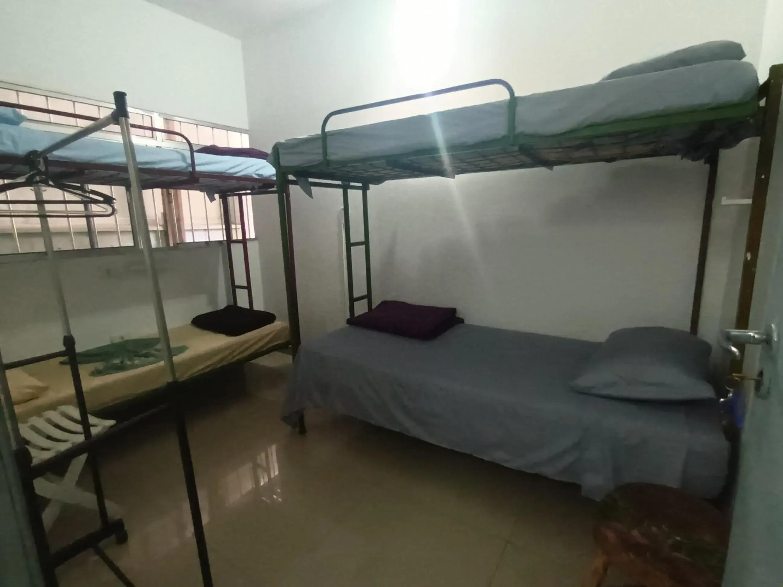 Triple Room - single occupancy in Girassol Hostel Vila Madalena Triple Room - single occupancy in Girassol Hostel Vila Madalena