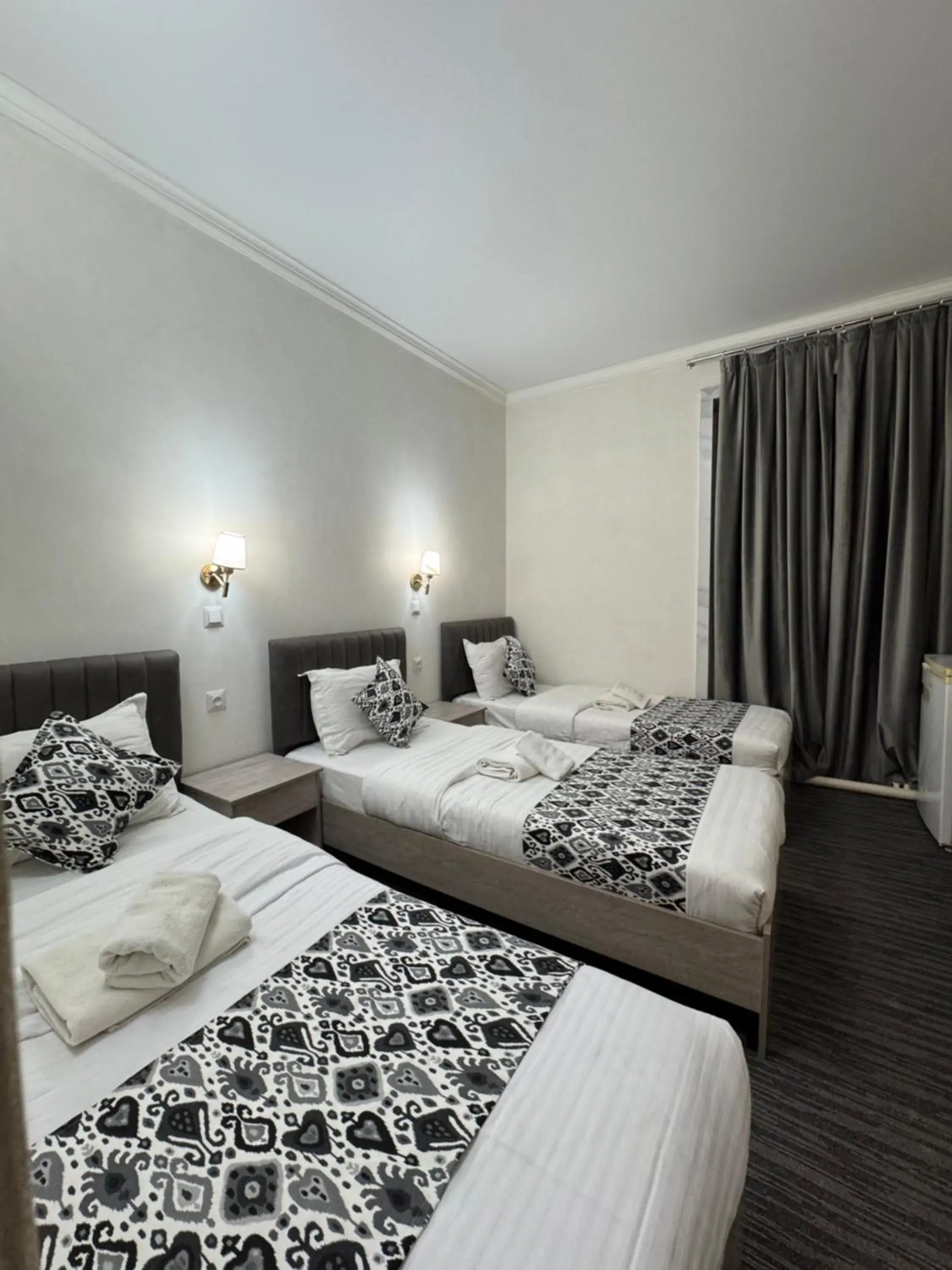 Triple Room in Orzu Hotel Triple Room in Orzu Hotel