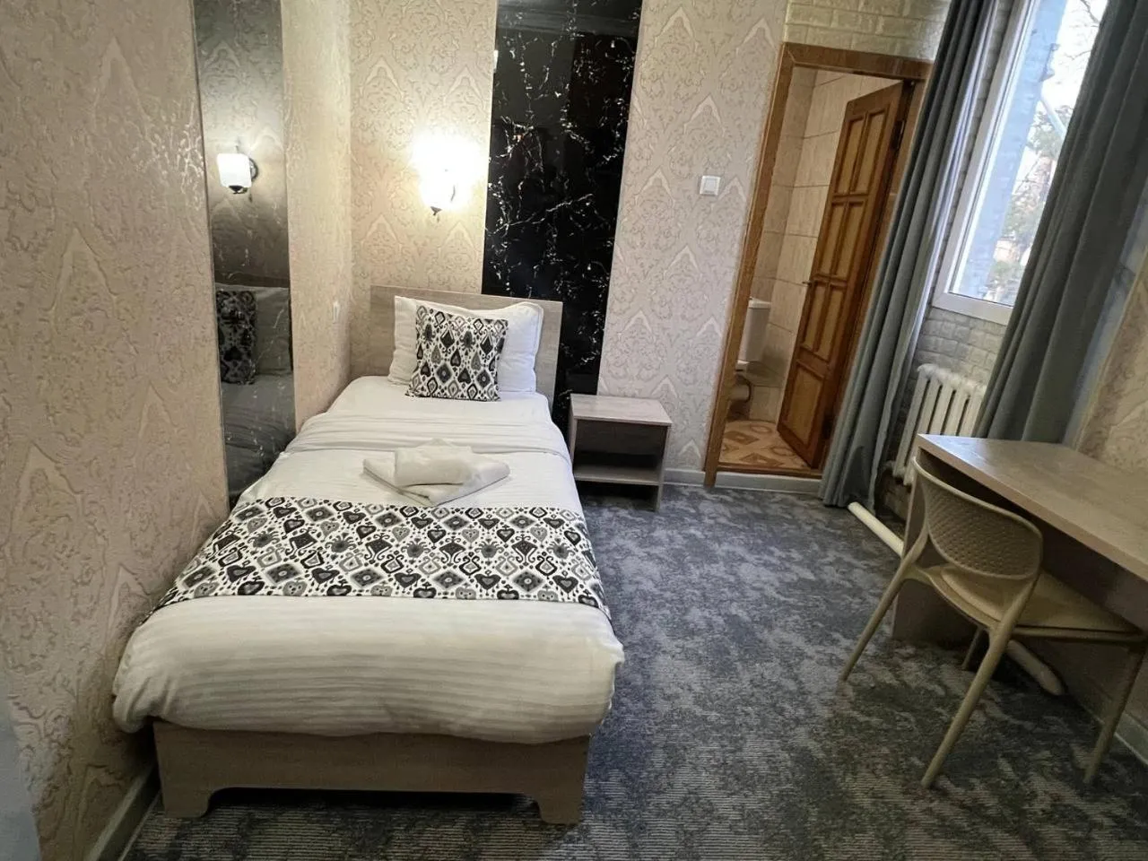 Bed in Orzu Hotel