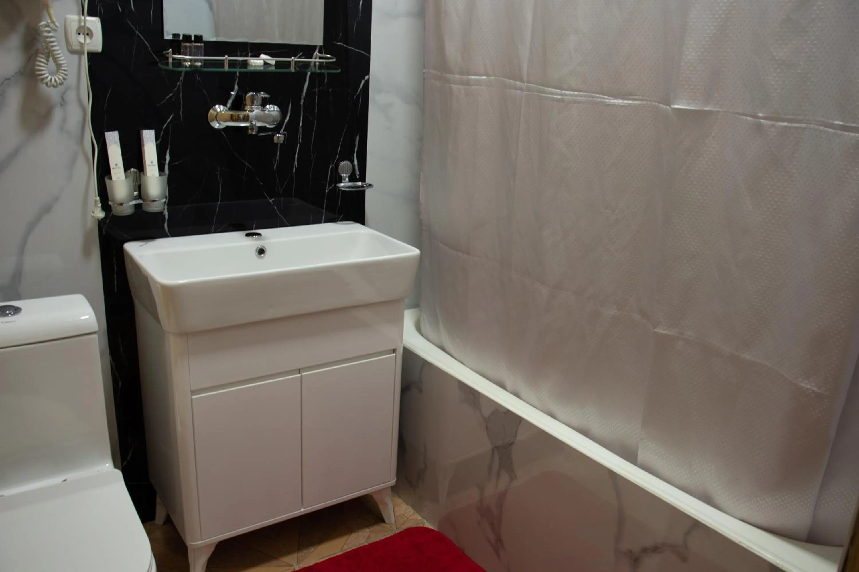 Shower in Orzu Hotel