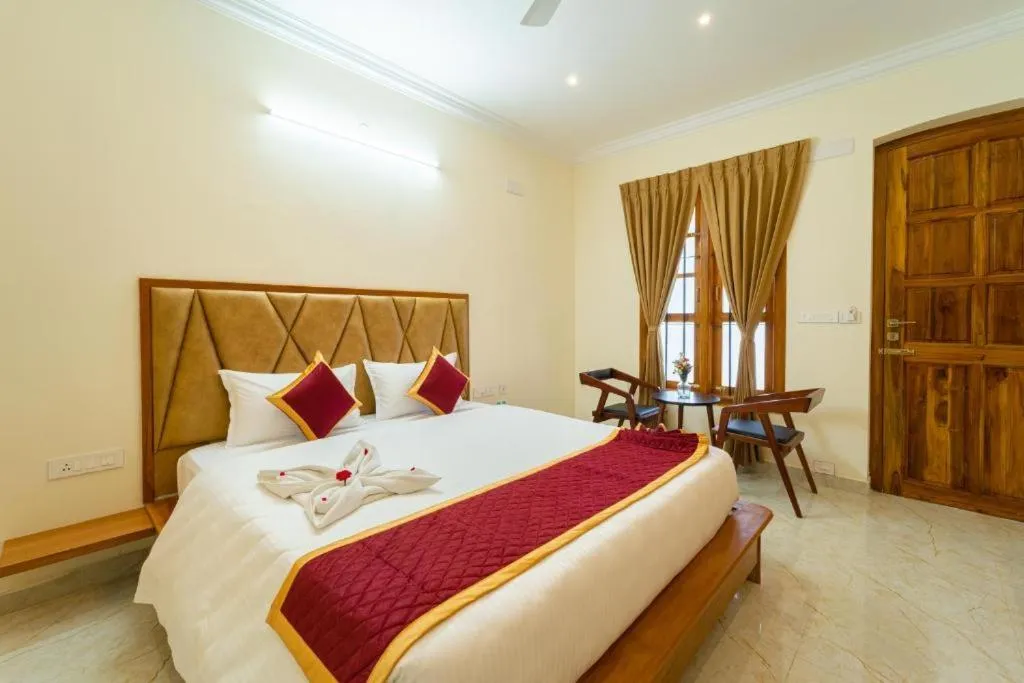 Bed in AR Phalazzo Resort and Banquets