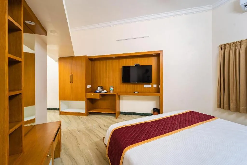 Communal lounge/ TV room, Bed in AR Phalazzo Resort and Banquets