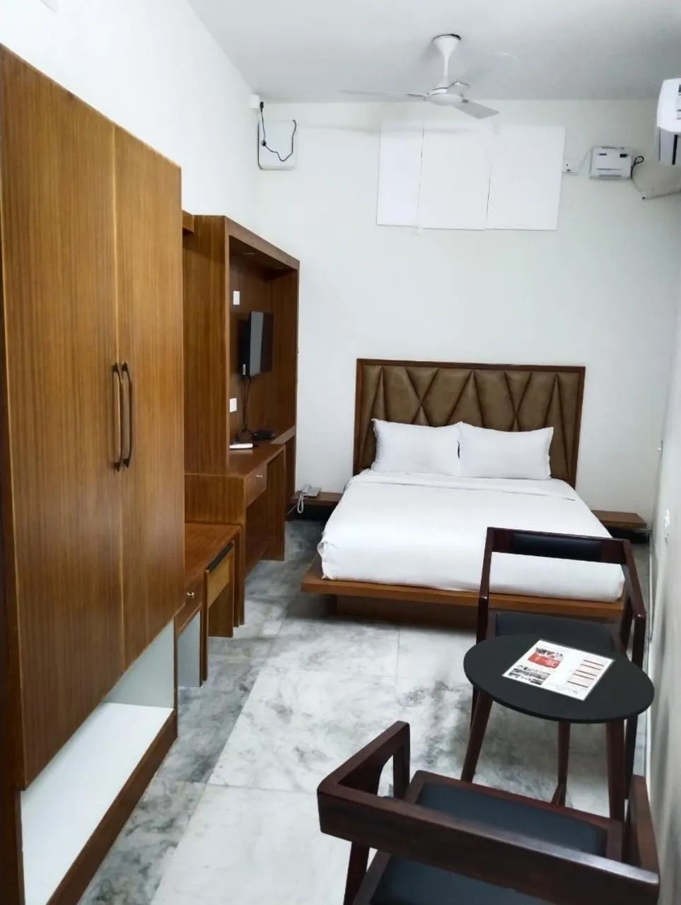 Bed in AR Phalazzo Resort and Banquets