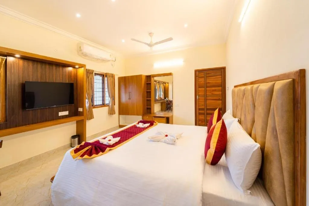 Bed in AR Phalazzo Resort and Banquets