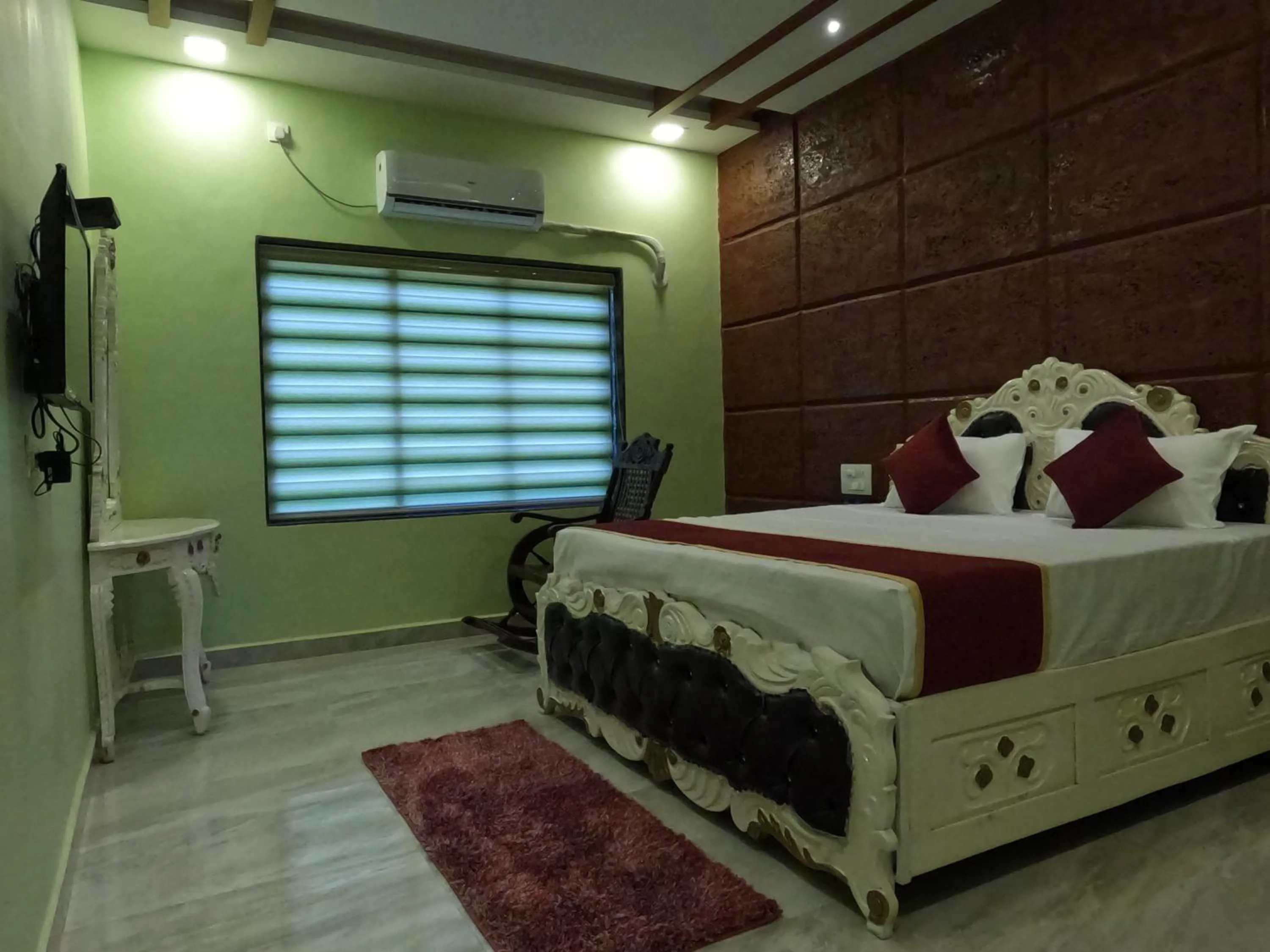 Bed in Kokan Heritage Resort