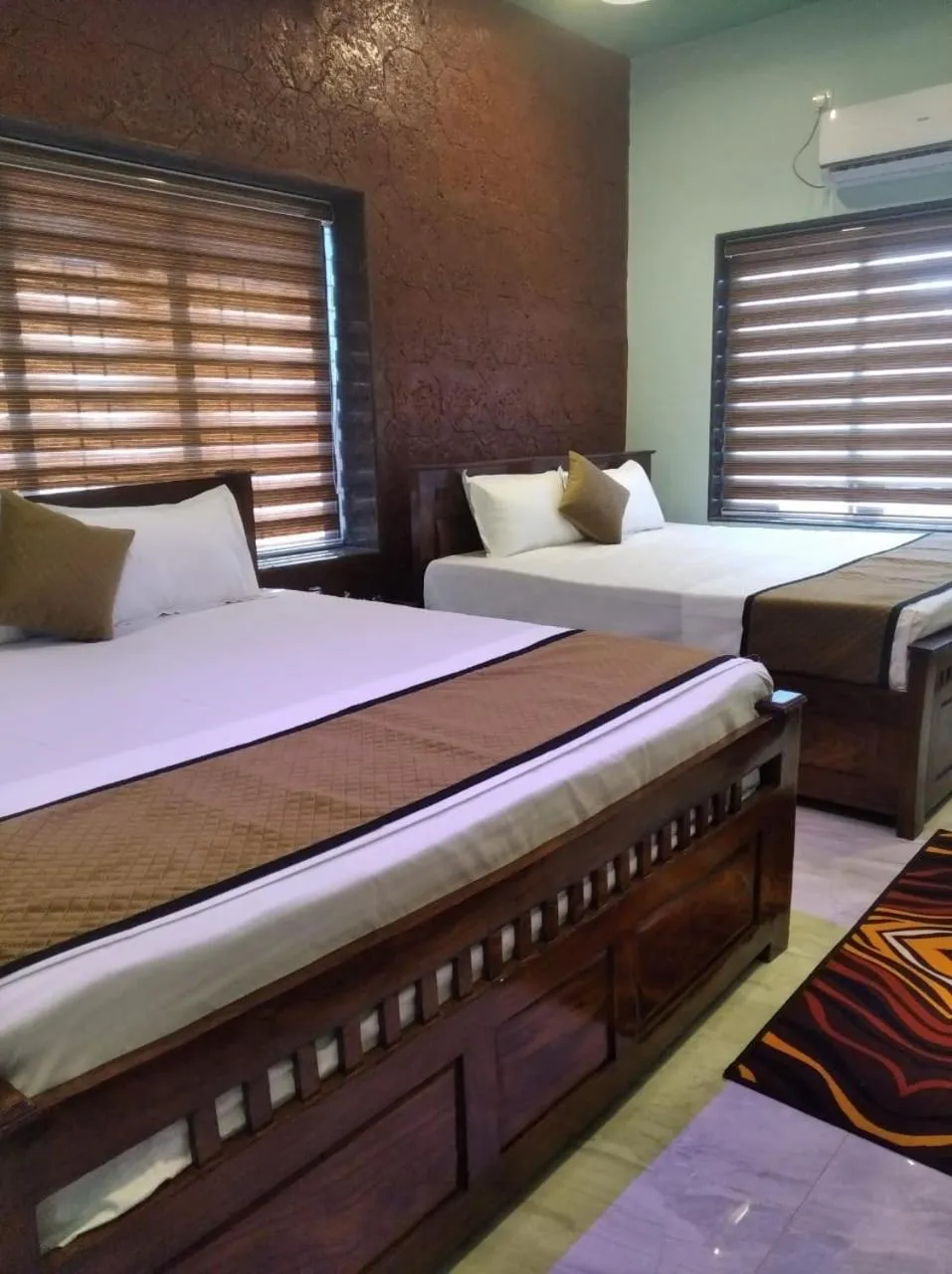 Photo of the whole room, Bed in Kokan Heritage Resort