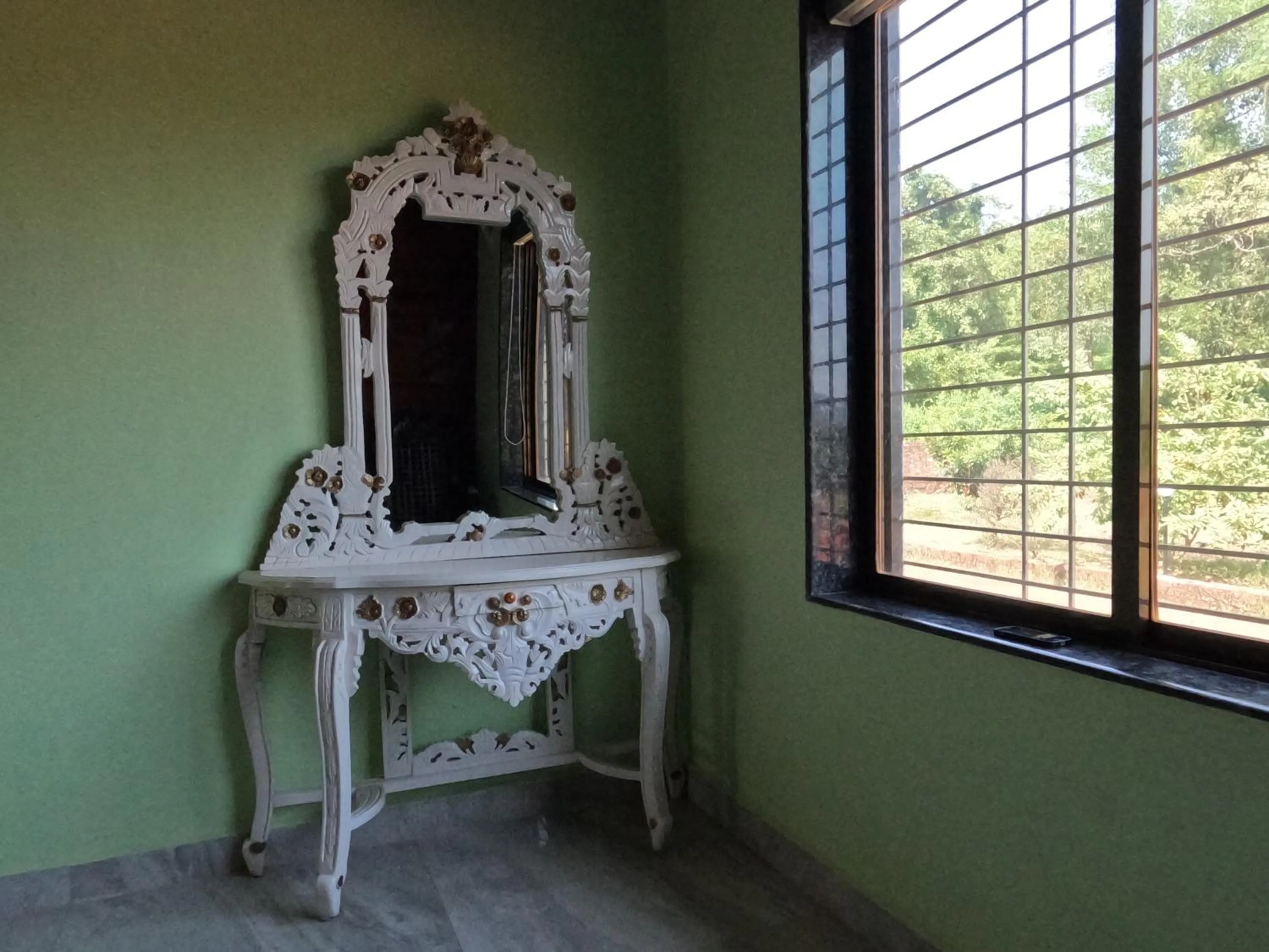 Bedroom in Kokan Heritage Resort