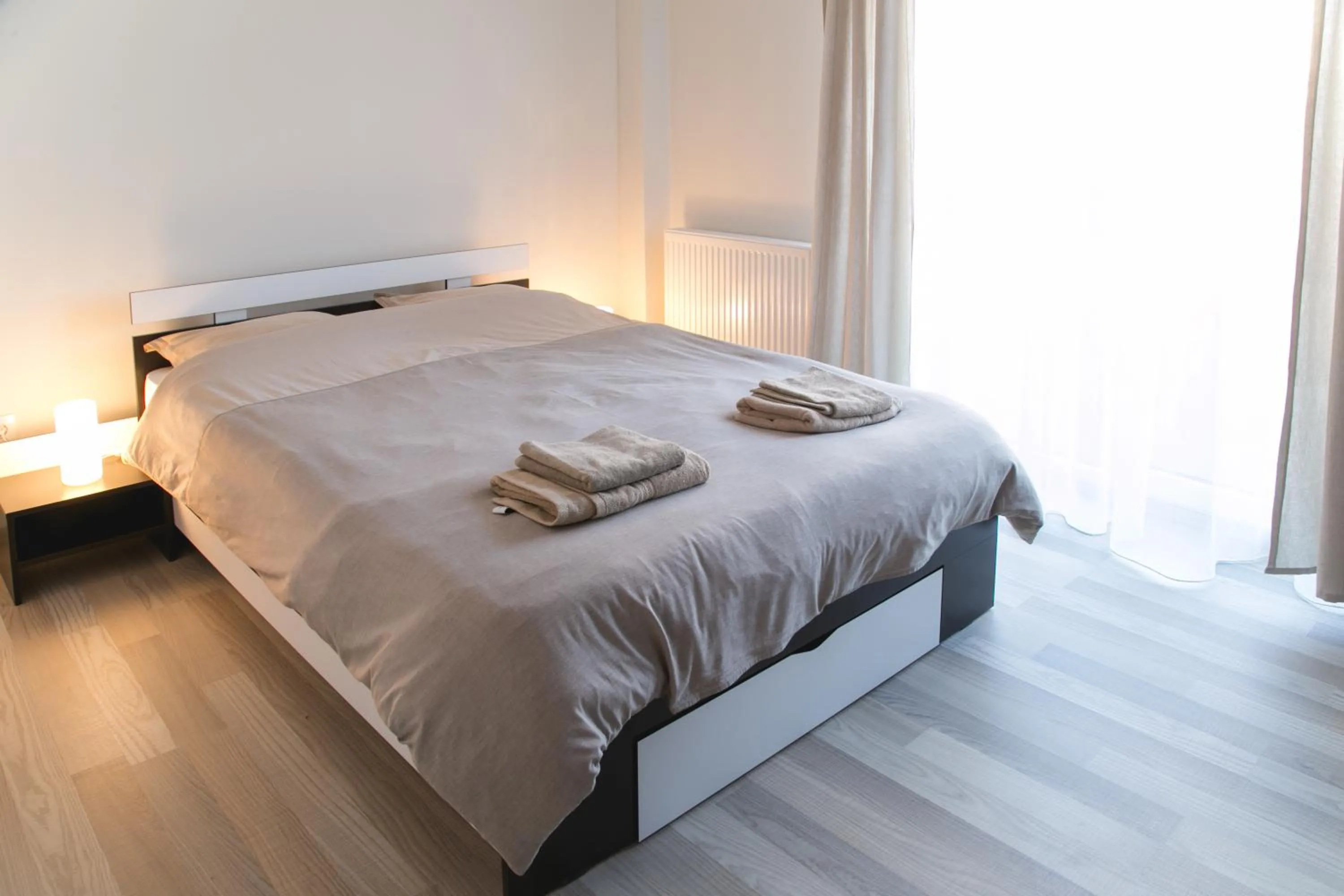 Bed in Hermann Apartments