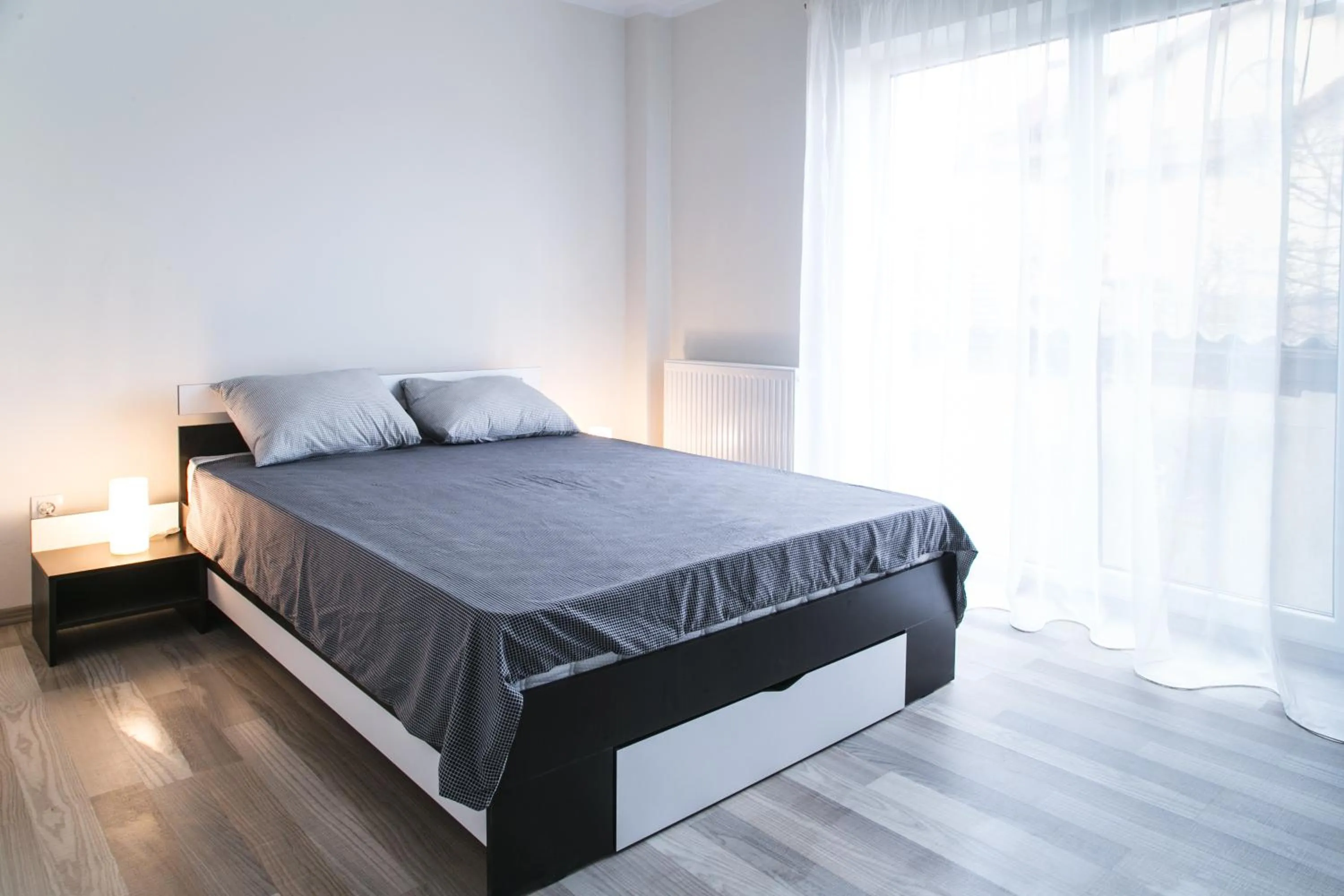Bed in Hermann Apartments