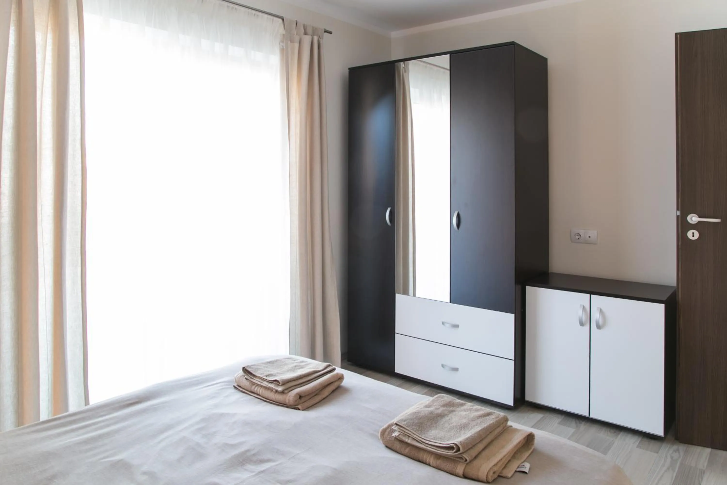 Bed in Hermann Apartments