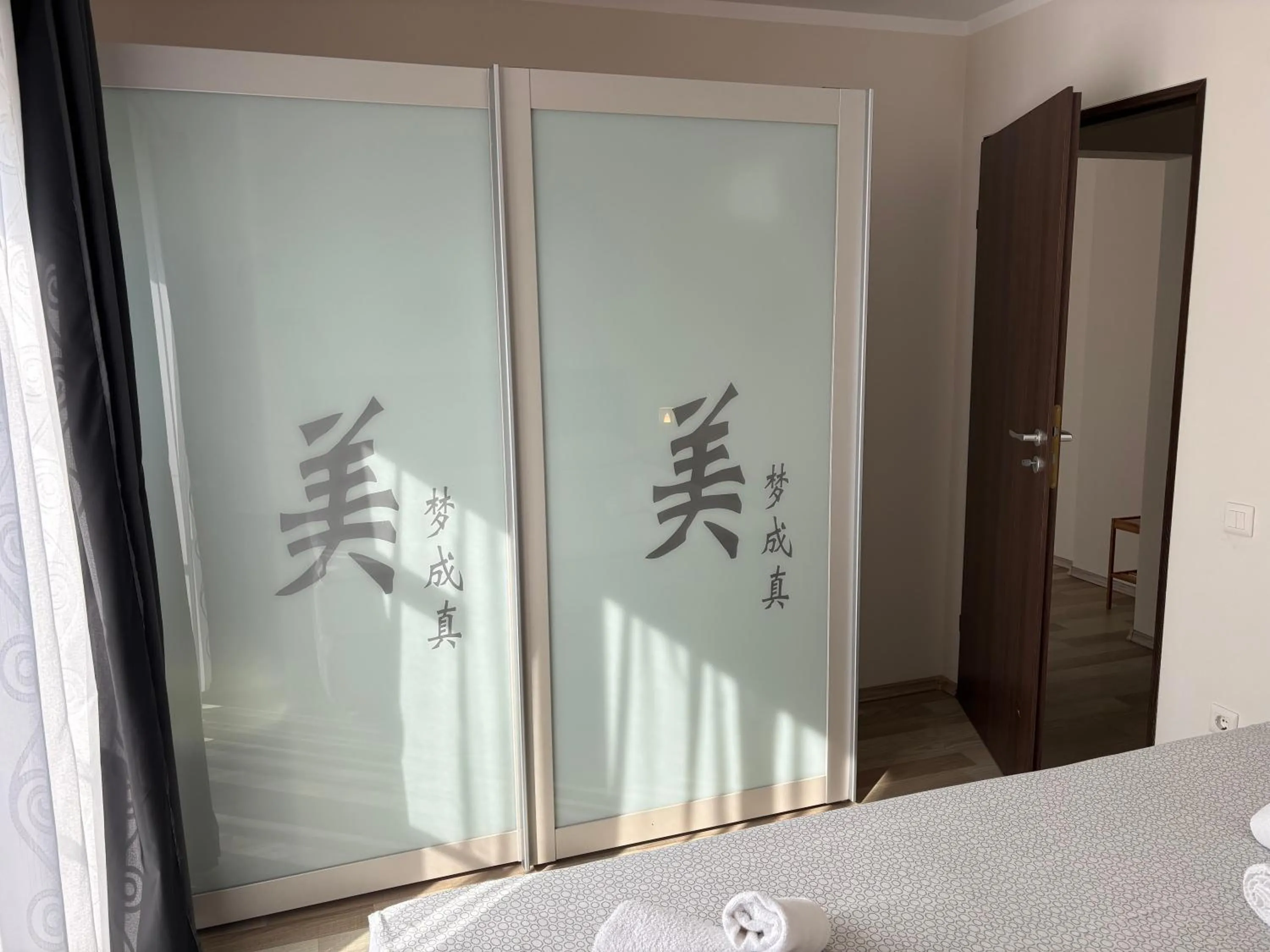 Bedroom in Hermann Apartments