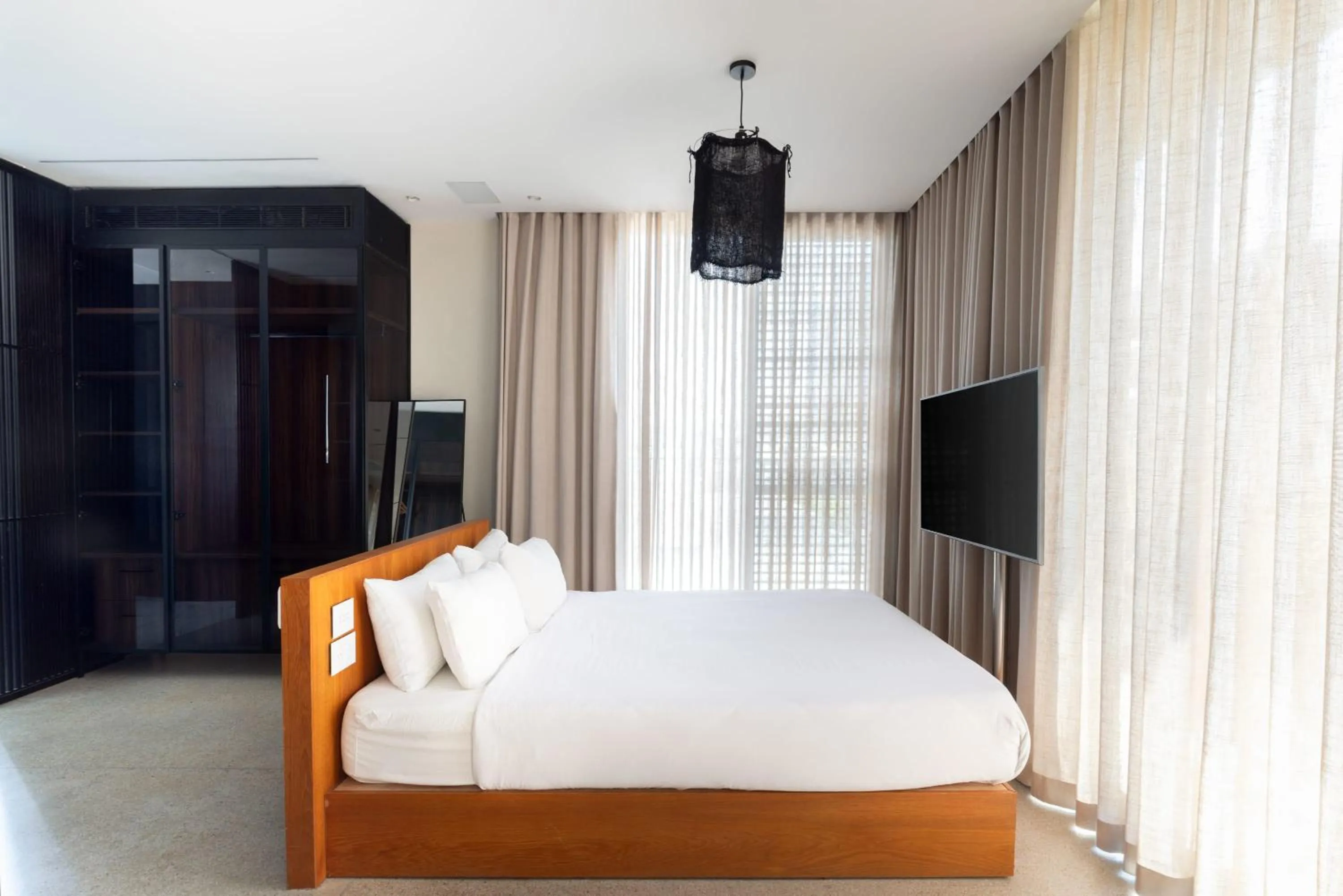 Bed in High Living Penthouse with Rooftop Pool