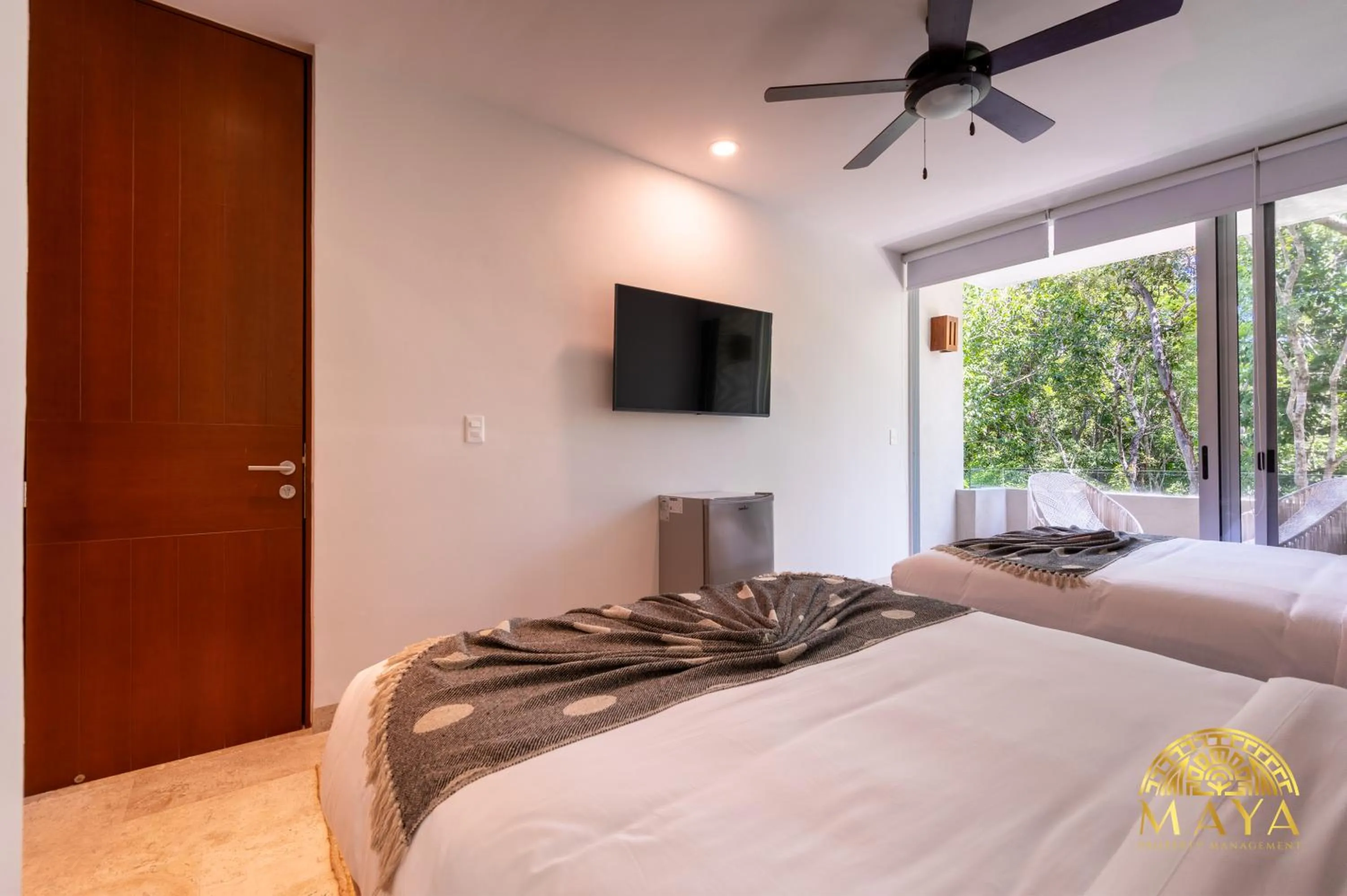Bed in Nhoa Tulum Aparthotel by Maya PM