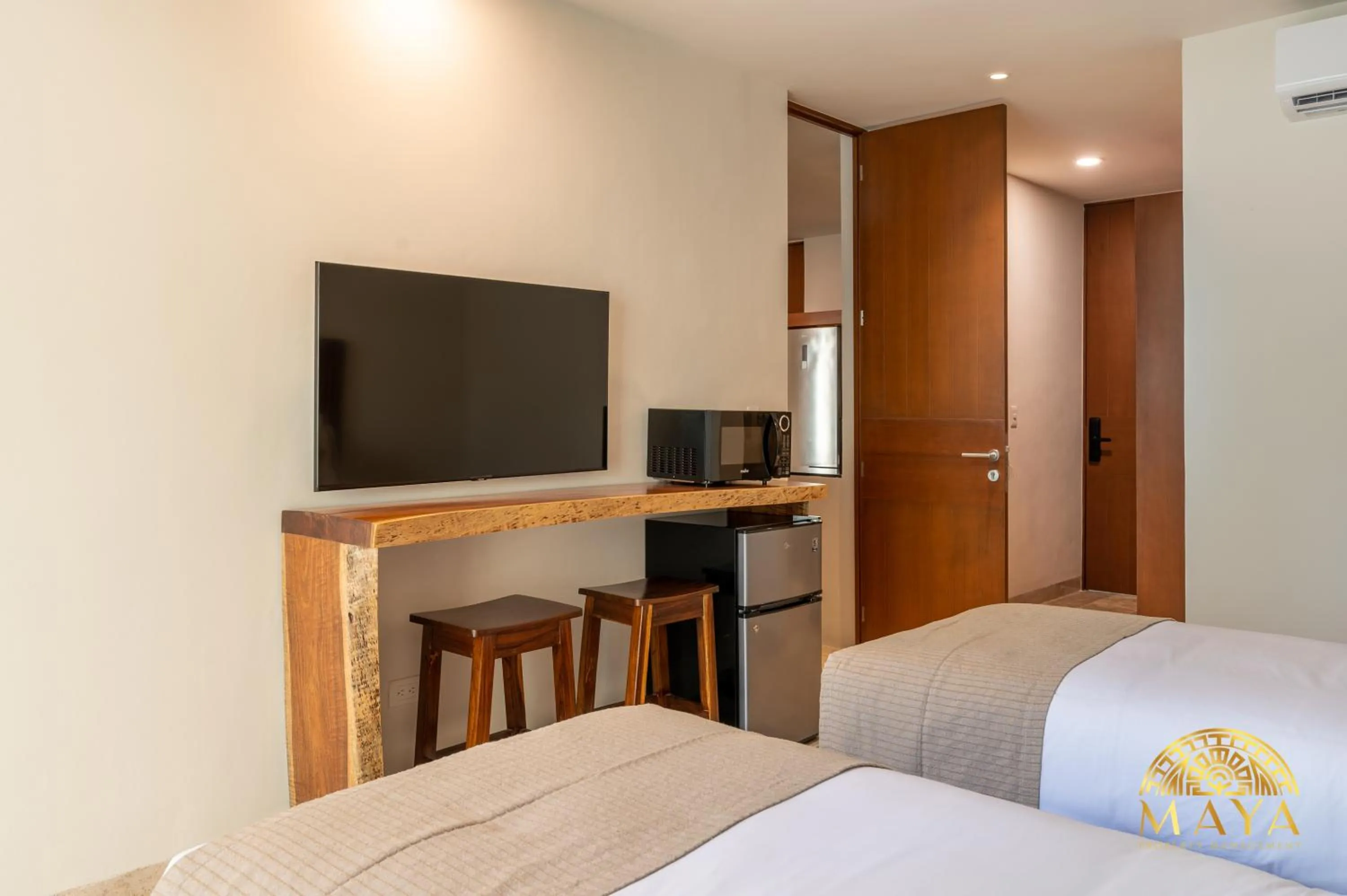 TV and multimedia, Bed in Nhoa Tulum Aparthotel by Maya PM