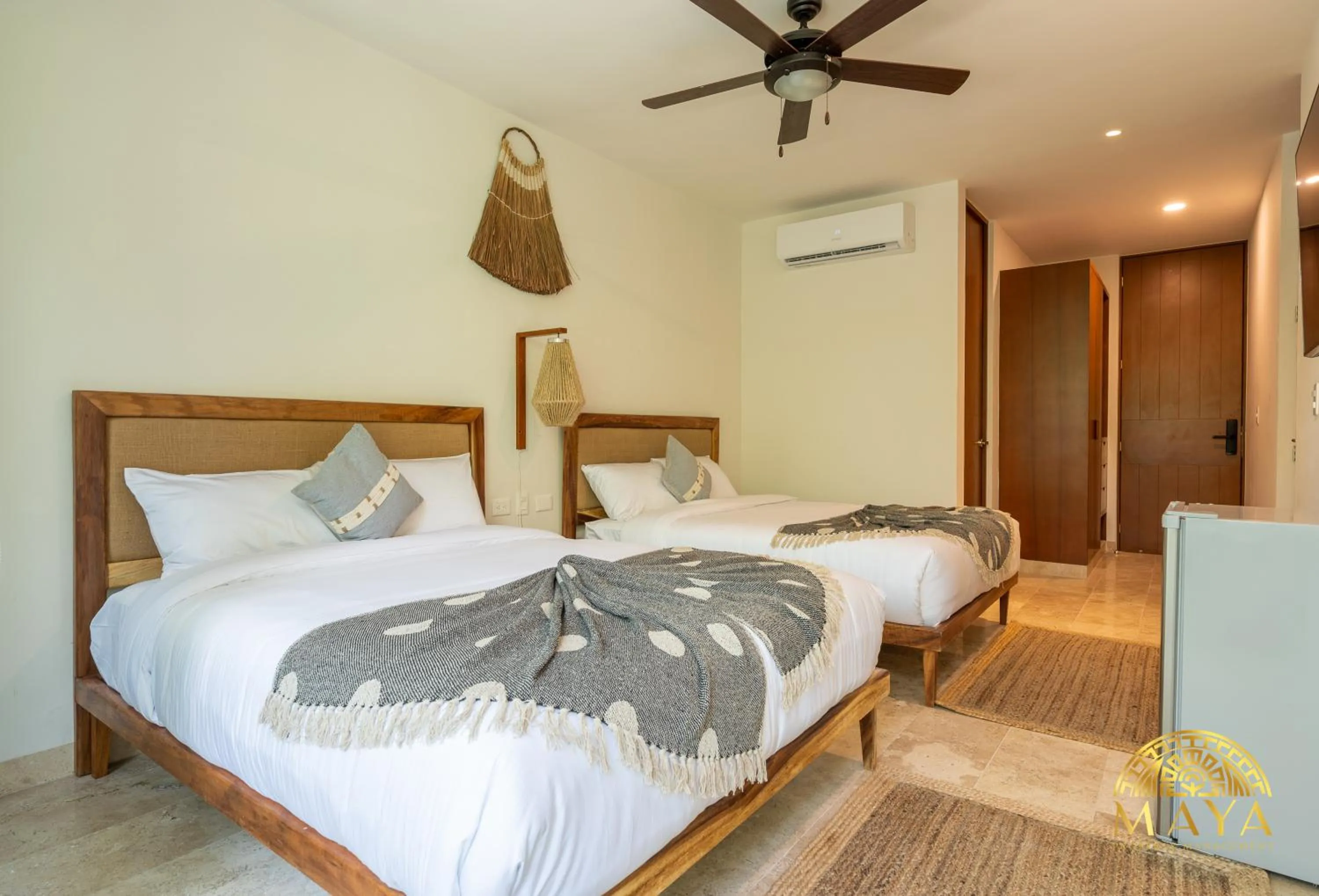 Bed in Nhoa Tulum Aparthotel by Maya PM