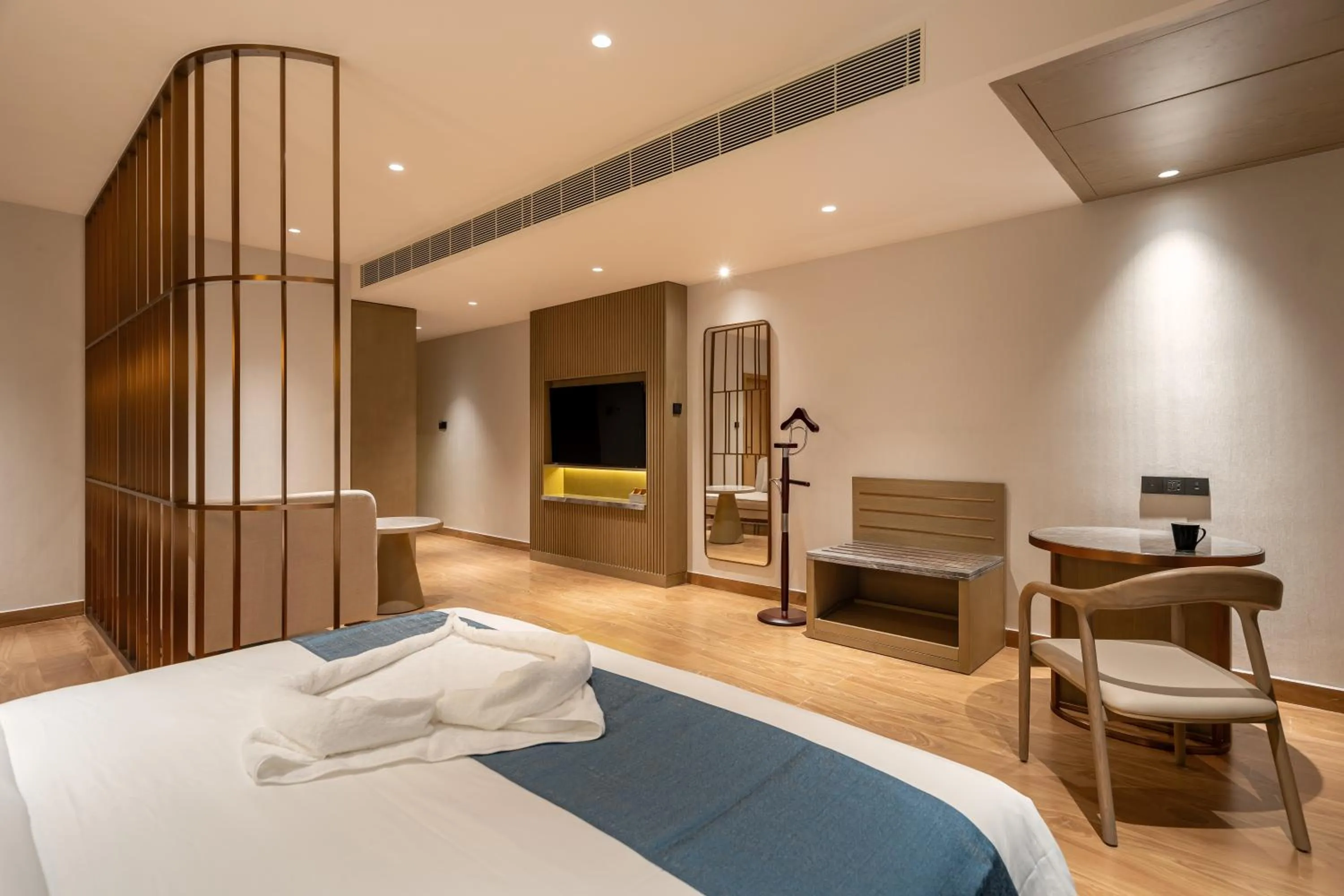 TV and multimedia, Bed in Copper Leaf Hotels, Tirunelveli